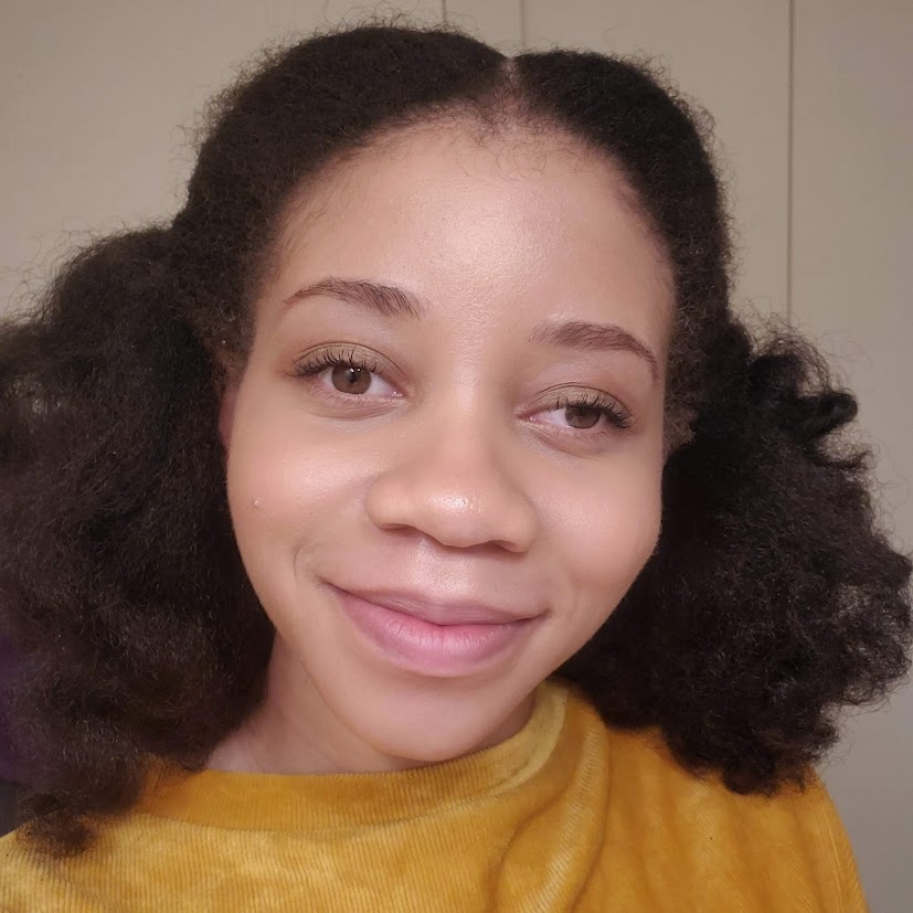 Selfie of a woman with a yellow dress on